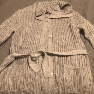 Cable knit sweater with buttons and belt
